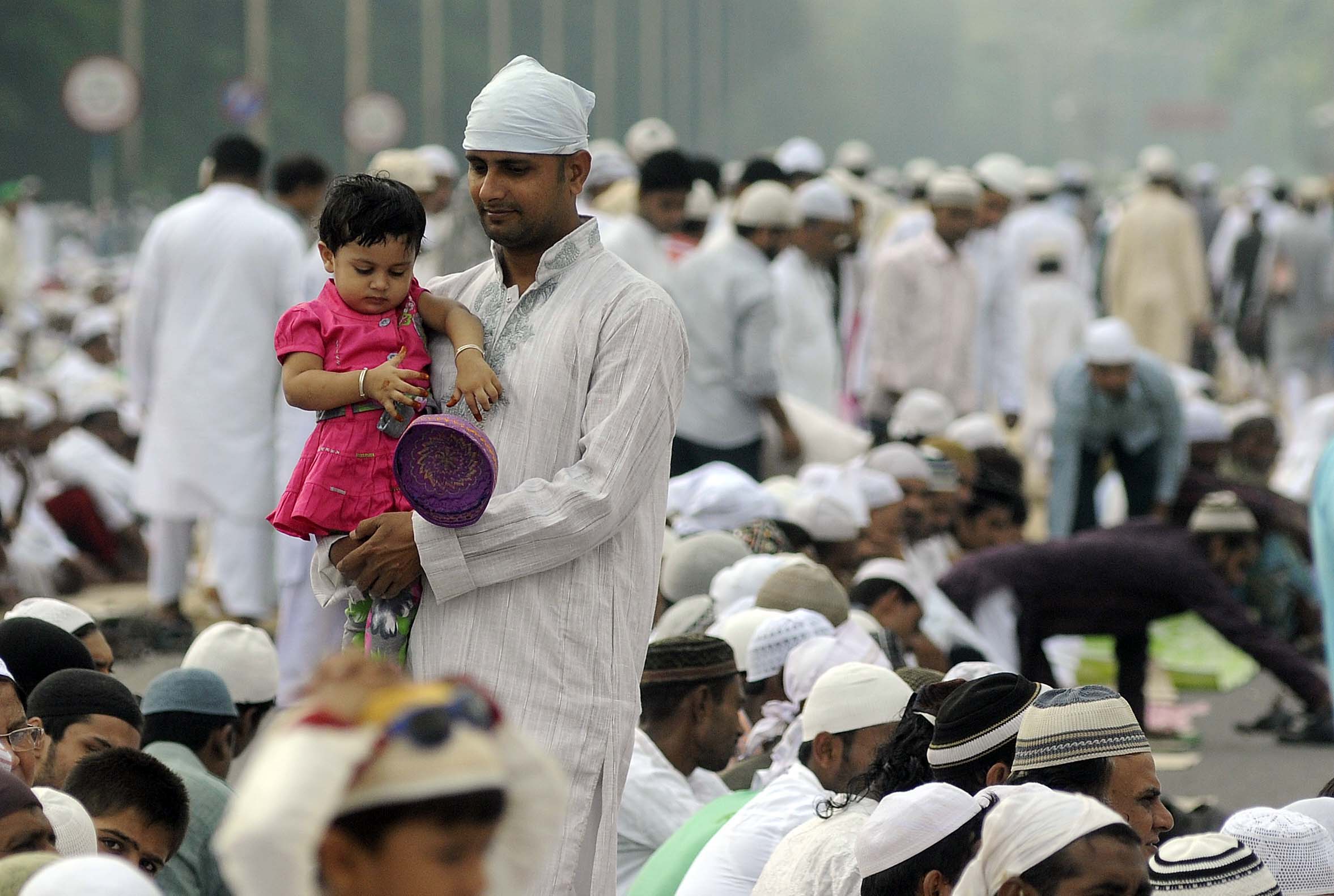 Muslims pray during Eid Al-Adha celebrations